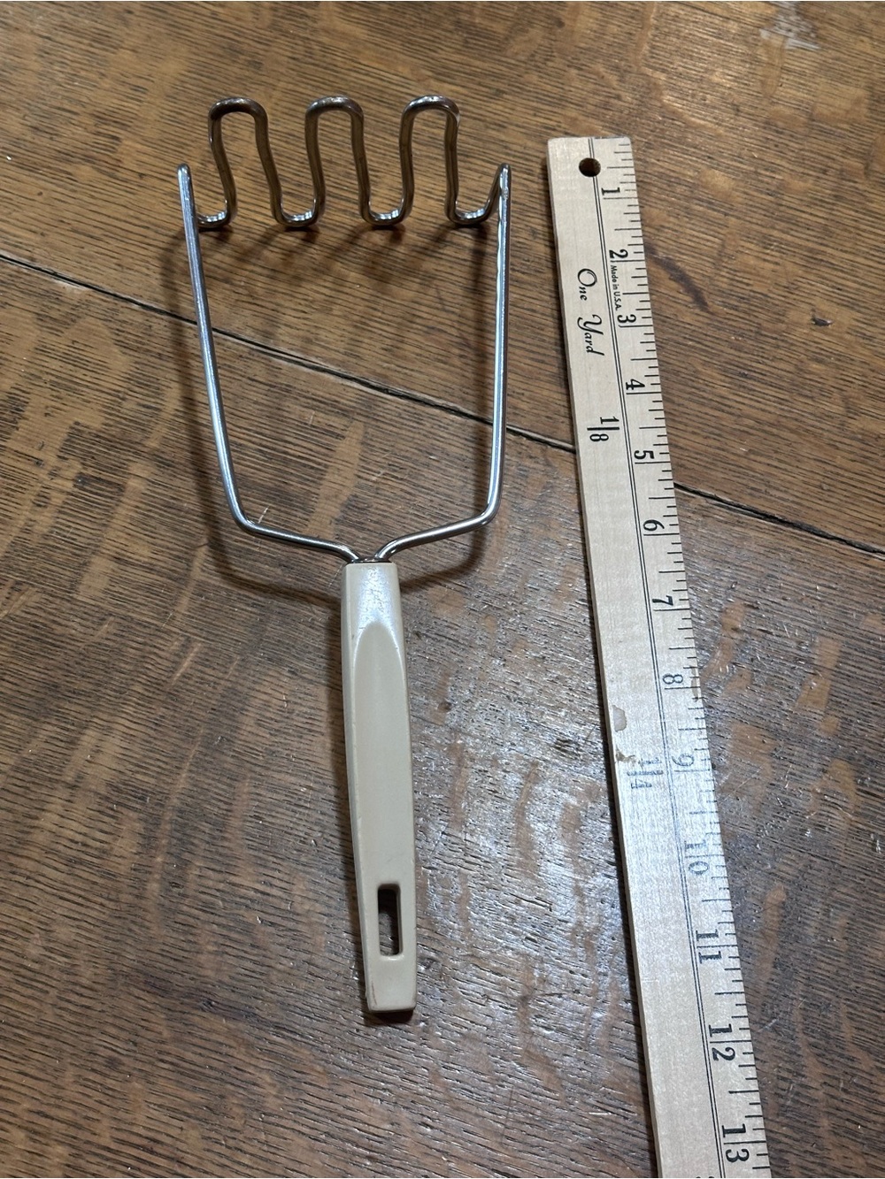 Vintage Beige Handheld Metal Potato Masher